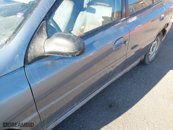 2001 Kia Rio with VIN KNADC123516046473, listed as a IAAI auction lot 41453919 with 193,582 mi miles. Bid and sale history available at carsss.com. Image 6.