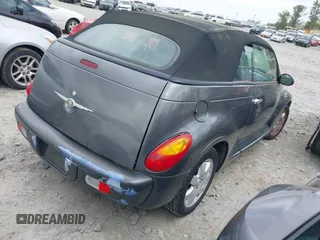 2005 Chrysler PT Cruiser Touring with VIN 3C3EY55E25T307023, listed as a IAAI auction lot 41921262 with 129,257 mi miles and . Bid and sale history available at DreamBid. Image 4.
