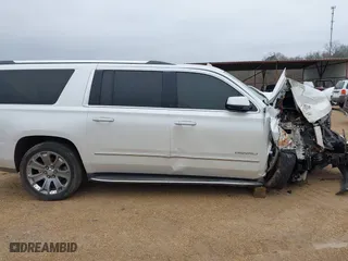 2016 GMC Yukon XL Denali with VIN 1GKS1HKJ8GR306576, listed as a IAAI auction lot 41518187 with 208,586 mi miles. Bid and sale history available at carsss.com. Image 14.