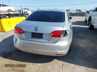 2014 Volkswagen Jetta S with VIN 3VW2K7AJ0EM391770, listed as a IAAI auction lot 42677433 with 200,032 mi miles and . Bid and sale history available at DreamBid. Image 13.