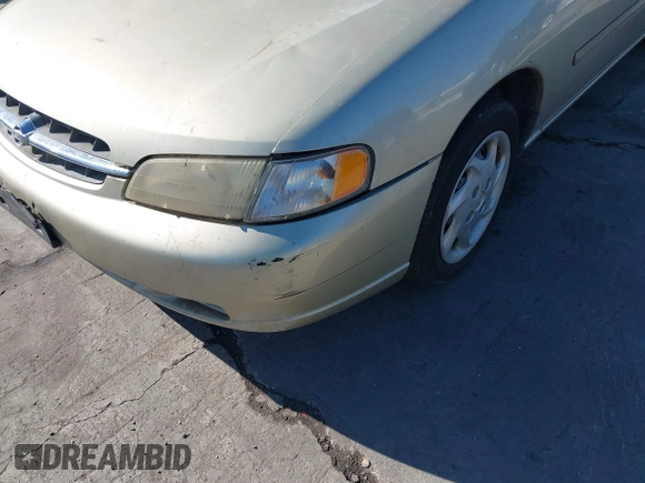 1999 Nissan Altima XE with VIN 1N4DL01D7XC108172, listed as a IAAI auction lot 41513029 with 192,958 mi miles. Bid and sale history available at carsss.com. Image 6.