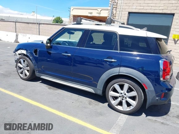 2017 MINI Countryman Cooper S z VIN WMZYT3C39H3D97769, wystawiony jako IAAI lot #42794779 z przebiegiem 126 880 mil mil oraz . Historia ofert i sprzedaży dostępna na DreamBid. Obrazek 3.