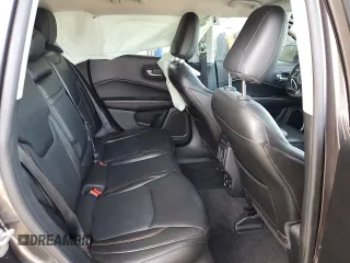 2018 Jeep Compass Limited z VIN 3C4NJCCBXJT361662, wystawiony jako Copart lot #57085315 z przebiegiem 61 815 mil mil oraz Szkoda całkowita • Salvage title. Historia ofert i sprzedaży dostępna na DreamBid. Obrazek 10.