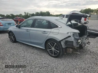 2023 Honda Civic Touring z VIN 2HGFE1F96PH311589, wystawiony jako Copart lot #58594035 z przebiegiem 17 762 mil mil oraz Szkoda całkowita • Salvage title. Historia ofert i sprzedaży dostępna na DreamBid. Obrazek 2.