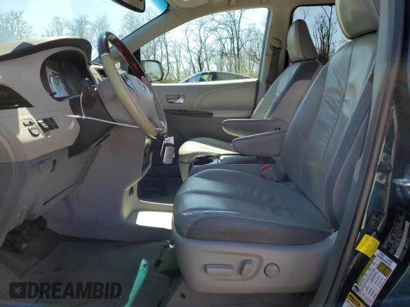 2011 Toyota Sienna XLE AAS with VIN 5TDYK3DC6BS170205, listed as a Copart auction lot 50868135 with 153,134 mi miles and Salvage Title. Bid and sale history available at DreamBid. Image 7.
