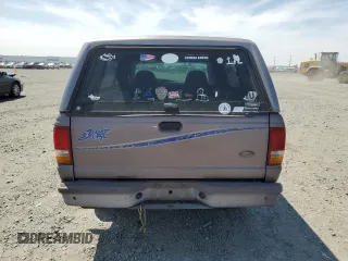 1995 Ford Ranger XLT z VIN 1FTCR10X0SPA73451, wystawiony jako Copart lot #60576195 z przebiegiem 140 064 mil mil oraz Czysty tytuł • Clean title. Historia ofert i sprzedaży dostępna na DreamBid. Obrazek 6.