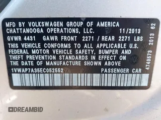 2014 Volkswagen Passat S w/Nav with VIN 1VWAP7A35EC052552, listed as a IAAI auction lot 41377109 with 123,273 mi miles. Bid and sale history available at carsss.com. Image 9.