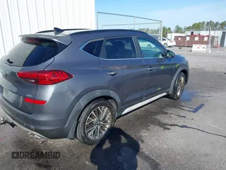 2019 Hyundai Tucson Ultimate with VIN KM8J3CAL5KU853538, listed as a IAAI auction lot 41752809 with 136,348 mi miles. Bid and sale history available at carsss.com. Image 4.