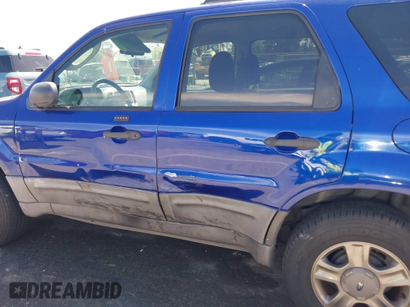 2005 Ford Escape XLS Value with VIN 1FMYU02Z85KD90338, listed as a IAAI auction lot 41916569 with 174,870 mi miles. Bid and sale history available at carsss.com. Image 6.