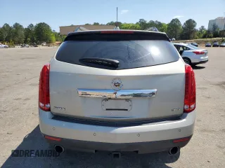 2015 Cadillac SRX Performance Collection z VIN 3GYFNCE31FS638057, wystawiony jako Copart lot #52454065 z przebiegiem 198 417 mil mil oraz Czysty tytuł • Clean title. Historia ofert i sprzedaży dostępna na DreamBid. Obrazek 6.