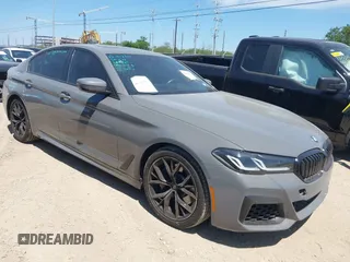 2021 BMW 5 Series 530i z VIN WBA53BH03MWX19966, wystawiony jako IAAI lot #42242130 z przebiegiem 73 716 mil mil oraz . Historia ofert i sprzedaży dostępna na DreamBid. Obrazek 1.