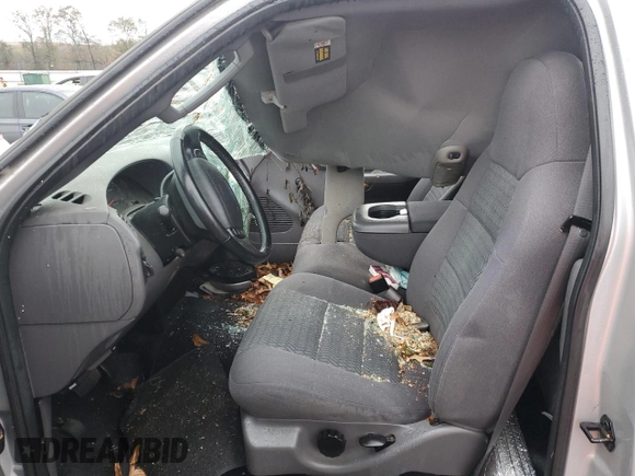 2003 Ford F-150 XL with VIN 1FTRF172X3NB77391, listed as a Copart auction lot 80657174 with Not Provided miles and Salvage Title. Bid and sale history available at DreamBid. Image 7.