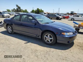 2000 Pontiac Grand Prix GT z VIN 1G2WP12K7YF189639, wystawiony jako Copart lot #57891595 z przebiegiem 70 055 mil mil oraz Tytuł czysty. Historia ofert i sprzedaży dostępna na DreamBid. Obrazek 4.
