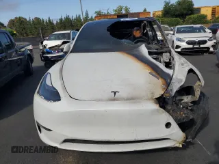2024 Tesla Model Y Long Range with VIN 7SAYGDEE1RF025842, listed as a Copart auction lot 56226065 with Not provided miles and Non repairable. Bid and sale history available at DreamBid. Image 5.