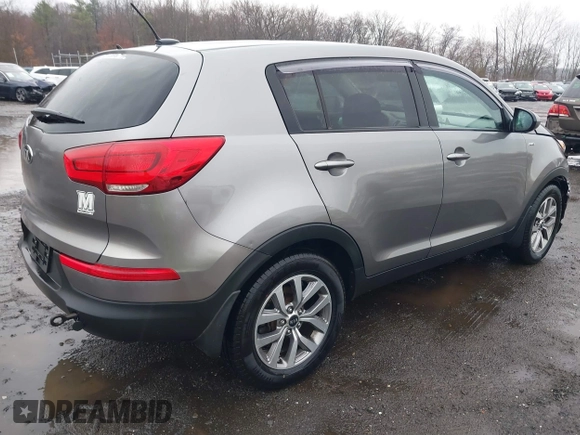 2014 Kia Sportage LX with VIN KNDPBCAC0E7601636, listed as a IAAI auction lot 41832978 with 145,353 mi miles and . Bid and sale history available at carsss.com. Image 4.