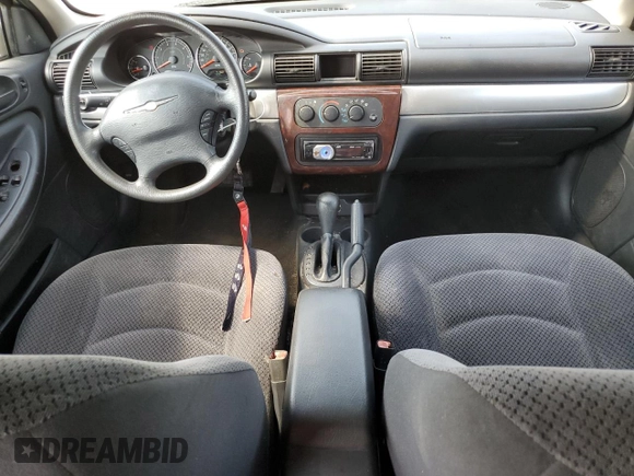 2006 Chrysler Sebring with VIN 1C3EL46X96N191300, listed as a Copart auction lot 71210704 with 216,589 mi miles and Salvage title. Bid and sale history available at DreamBid. Image 8.