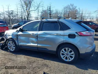 2020 Ford Edge Titanium z VIN 2FMPK4K96LBA00515, wystawiony jako IAAI lot #41757974 z przebiegiem 76 242 mil mil oraz . Historia ofert i sprzedaży dostępna na DreamBid. Obrazek 14.