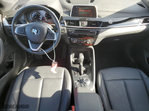 2019 BMW X1 xDrive28i with VIN WBXHT3C53K5L35670, listed as a Copart auction lot 53493245 with 14,201 mi miles and Salvage Title. Bid and sale history available at carsss.com. Image 8.