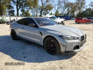 2023 BMW M4 Competition xDrive with VIN WBS43AZ06PCM15004, listed as a Copart auction lot 43222884 with 18,658 mi miles. Bid and sale history available at carsss.com. Image 4.