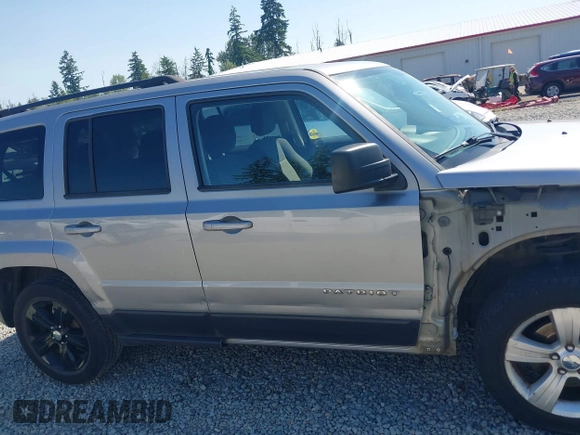 2016 Jeep Patriot Latitude with VIN 1C4NJPFA2GD633341, listed as a IAAI auction lot 42403814 with 98,768 mi miles and . Bid and sale history available at DreamBid. Image 14.