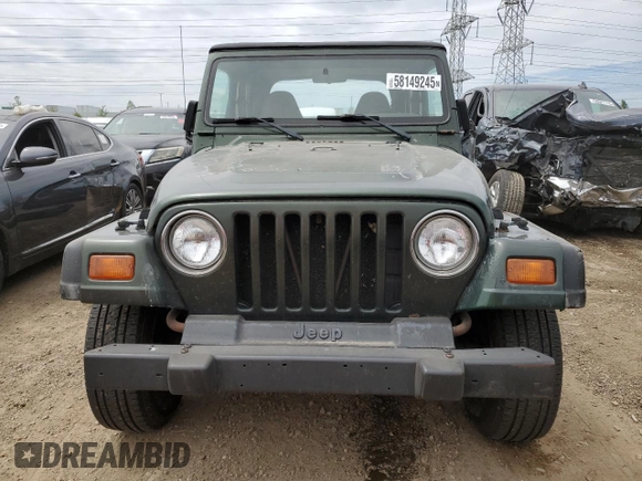 1998 Jeep Wrangler SE with VIN 1J4FY29P9WP767516, listed as a Copart auction lot 58149245 with 190,964 mi miles and Salvage title. Bid and sale history available at DreamBid. Image 5.