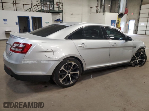 2015 Ford Taurus SEL z VIN 1FAHP2E85FG177576, wystawiony jako Copart lot #54739595 z przebiegiem 89 156 mil mil oraz Szkoda całkowita • Salvage title. Historia ofert i sprzedaży dostępna na DreamBid. Obrazek 3.