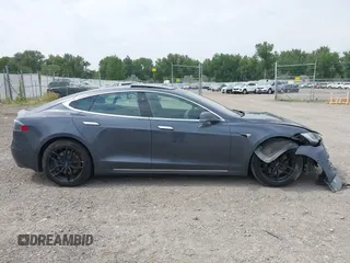2019 Tesla Model S 75D with VIN 5YJSA1E22KF300407, listed as a IAAI auction lot 40034839 with 59,178 mi miles and . Bid and sale history available at DreamBid. Image 12.