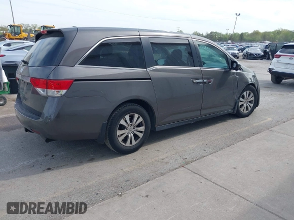 2014 Honda Odyssey EX-L with VIN 5FNRL5H67EB106183, listed as a IAAI auction lot 42210600 with 196,166 mi miles and . Bid and sale history available at DreamBid. Image 4.