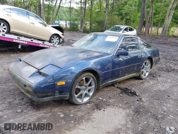 1989 Nissan 300ZX z VIN JN1HZ14S7KX290051, wystawiony jako IAAI lot #42203078 z przebiegiem 136 643 mil mil oraz . Historia ofert i sprzedaży dostępna na DreamBid. Obrazek 2.