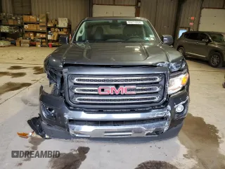 2015 GMC Canyon 4WD SLE with VIN 1GTG6BE37F1118335, listed as a Copart auction lot 85271264 with 58,679 mi miles and Salvage Title. Bid and sale history available at carsss.com. Image 5.