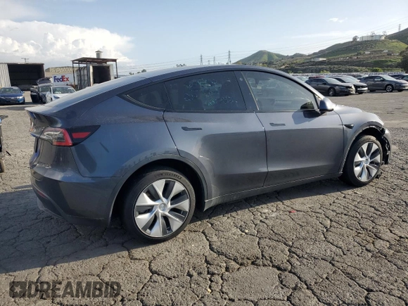 2021 Tesla Model Y Standard Range with VIN 5YJYGDED7MF109418, listed as a Copart auction lot 51590135 with 86,668 mi miles and Salvage Title. Bid and sale history available at DreamBid. Image 3.
