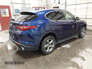 2018 Alfa Romeo Stelvio z VIN ZASFAKAN6J7B74782, wystawiony jako IAAI lot #41939007 z przebiegiem 48 210 mil mil oraz . Historia ofert i sprzedaży dostępna na DreamBid. Obrazek 4.