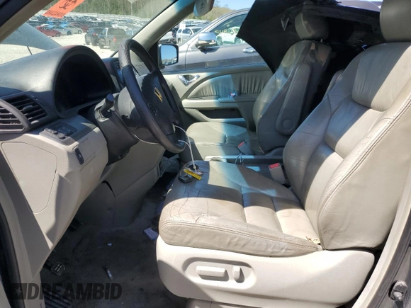 2005 Honda Odyssey EX-L z VIN 5FNRL38655B060017, wystawiony jako Copart lot #55337445 z przebiegiem 206 843 mil mil oraz Czysty tytuł • Clean title. Historia ofert i sprzedaży dostępna na DreamBid. Obrazek 7.