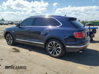2017 Bentley Bentayga W12 z VIN SJAAC2ZV2HC014547, wystawiony jako Copart lot #57488755 z przebiegiem 63 359 mil mil oraz Tytuł czysty. Historia ofert i sprzedaży dostępna na DreamBid. Obrazek 2.
