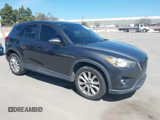 2015 Mazda CX-5 Grand Touring with VIN JM3KE2DY3F0467368, listed as a IAAI auction lot 41890855 with 201,513 mi miles. Bid and sale history available at carsss.com. Image 1.