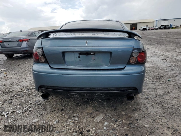 2005 Pontiac GTO z VIN 6G2VX12UX5L352121, wystawiony jako Copart lot #56840425 z przebiegiem 42 265 mil mil oraz Szkoda całkowita • Salvage title. Historia ofert i sprzedaży dostępna na DreamBid. Obrazek 6.