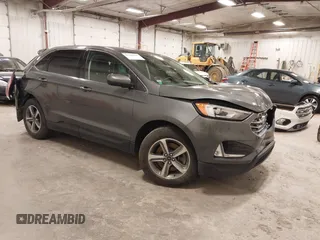 2021 Ford Edge SEL with VIN 2FMPK4J91MBA18228, listed as a IAAI auction lot 41943333 with 100,088 mi miles. Bid and sale history available at carsss.com. Image 1.