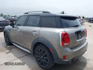 2018 MINI Countryman Cooper S with VIN WMZYT3C3XJ3E00006, listed as a IAAI auction lot 42420388 with 117,313 mi miles and . Bid and sale history available at DreamBid. Image 3.