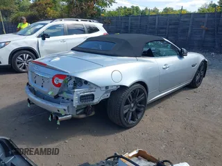 2012 Jaguar XK with VIN SAJWA4EC9CMB45251, listed as a IAAI auction lot 40242636 with 61,538 mi miles. Bid and sale history available at carsss.com. Image 4.