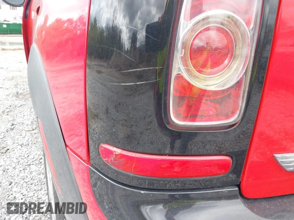 2013 MINI Clubman z VIN WMWZF3C50DT490262, wystawiony jako IAAI lot #41674033 z przebiegiem 194 622 mil mil oraz . Historia ofert i sprzedaży dostępna na DreamBid. Obrazek 13.