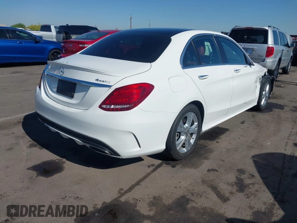 2015 Mercedes-Benz C 300 Luxury with VIN 55SWF4KB6FU087362, listed as a IAAI auction lot 42083502 with 98,834 mi miles and . Bid and sale history available at carsss.com. Image 4.