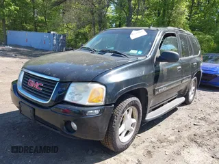 2005 GMC Envoy SLE z VIN 1GKDT13S452198027, wystawiony jako IAAI lot #42243258 z przebiegiem 144 240 mil mil oraz . Historia ofert i sprzedaży dostępna na DreamBid. Obrazek 6.