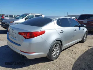 2013 Kia Optima LX z VIN KNAGM4A70D5414844, wystawiony jako IAAI lot #41774246 z przebiegiem 180 332 mil mil oraz . Historia ofert i sprzedaży dostępna na DreamBid. Obrazek 4.