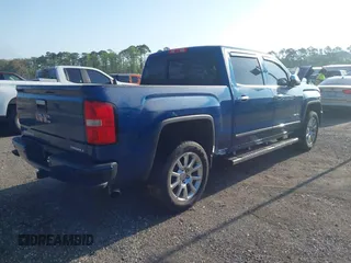2015 GMC Sierra 1500 Denali z VIN 3GTP1WEC2FG201307, wystawiony jako IAAI lot #41931366 z przebiegiem 99 644 mil mil oraz . Historia ofert i sprzedaży dostępna na DreamBid. Obrazek 4.