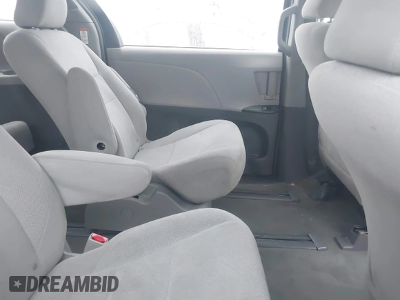 2015 Toyota Sienna L with VIN 5TDZK3DC9FS563593, listed as a IAAI auction lot 41466419 with 136,394 mi miles and . Bid and sale history available at DreamBid. Image 8.