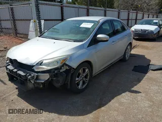 2014 Ford Focus SE with VIN 1FADP3F26EL270868, listed as a IAAI auction lot 41826493 with 164,595 mi miles. Bid and sale history available at carsss.com. Image 2.