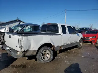 2002 Ford F-150 XL with VIN 1FTRX17L52NA26169, listed as a Copart auction lot 88756715 with 114,841 mi miles and Salvage title. Bid and sale history available at DreamBid. Image 3.