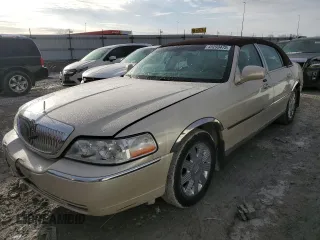 2003 Lincoln Town Car Cartier z VIN 1LNHM83W43Y614203, wystawiony jako Copart lot #45293475 z przebiegiem 139 564 mil mil oraz Szkoda całkowita • Salvage title. Historia ofert i sprzedaży dostępna na DreamBid. Obrazek 1.