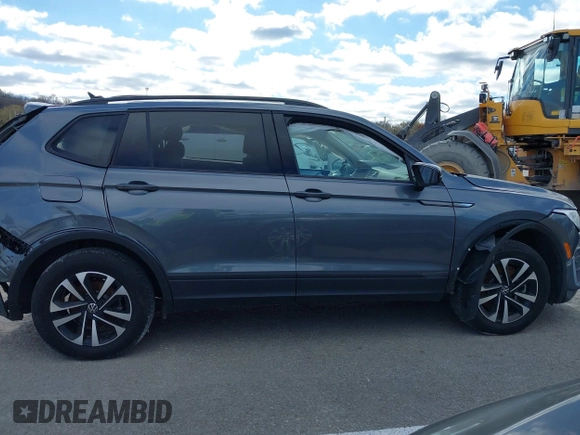 2023 Volkswagen Tiguan S with VIN 3VVRB7AXXPM033845, listed as a IAAI auction lot 40918862 with 38,122 mi miles and . Bid and sale history available at DreamBid. Image 13.