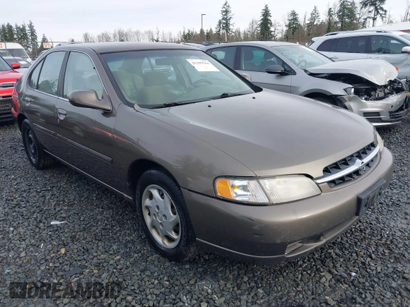 1999 Nissan Altima XE with VIN 1N4DL01D1XC210017, listed as a IAAI auction lot 41199544 with 297,917 mi miles. Bid and sale history available at carsss.com. Image 1.